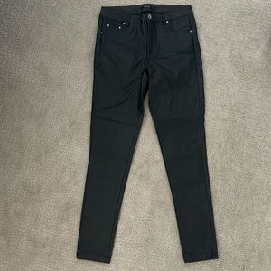 Pleather black skinny pants. Size Large. Never been worn.